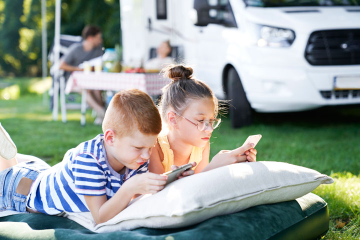 Reading in comfort by the camper van